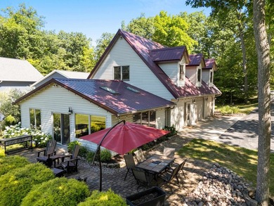 Experience the best of Northwoods living in a desirable home on - photo 2