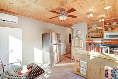 Come and enjoy the vistas of Abiquiu Lake and the red rocks of - photo 11