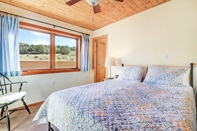 Come and enjoy the vistas of Abiquiu Lake and the red rocks of - photo 13