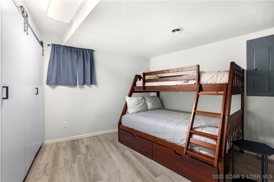 Welcome to your dream lakefront retreat in the Lake of the