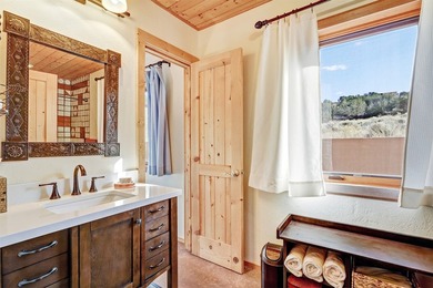 Come and enjoy the vistas of Abiquiu Lake and the red rocks of - photo 14