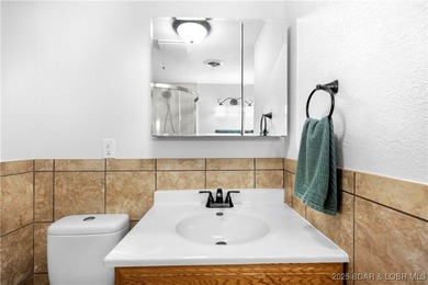 Welcome to your dream lakefront retreat in the Lake of the