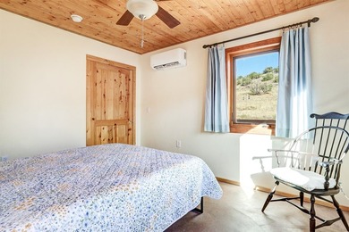 Come and enjoy the vistas of Abiquiu Lake and the red rocks of - photo 16