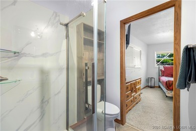 Welcome to your dream lakefront retreat in the Lake of the