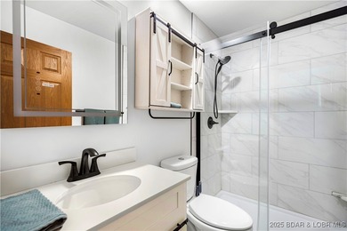 Welcome to your dream lakefront retreat in the Lake of the