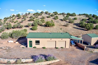 Come and enjoy the vistas of Abiquiu Lake and the red rocks of - photo 19
