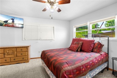 Welcome to your dream lakefront retreat in the Lake of the