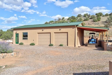 Come and enjoy the vistas of Abiquiu Lake and the red rocks of - photo 20