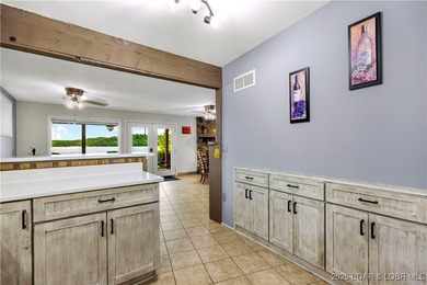 Welcome to your dream lakefront retreat in the Lake of the