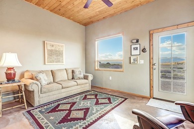 Come and enjoy the vistas of Abiquiu Lake and the red rocks of - photo 24
