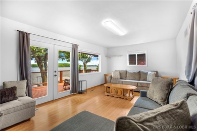 Welcome to your dream lakefront retreat in the Lake of the