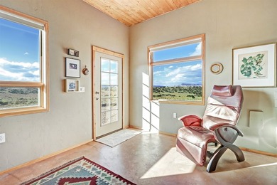 Come and enjoy the vistas of Abiquiu Lake and the red rocks of - photo 25
