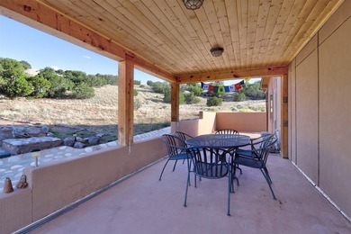 Come and enjoy the vistas of Abiquiu Lake and the red rocks of - photo 26