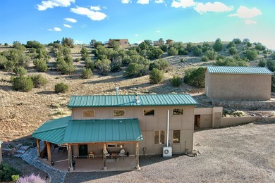 Come and enjoy the vistas of Abiquiu Lake and the red rocks of - photo 28