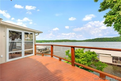 Welcome to your dream lakefront retreat in the Lake of the