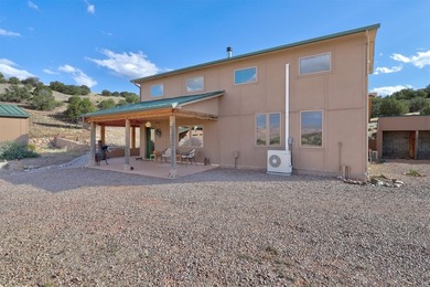 Come and enjoy the vistas of Abiquiu Lake and the red rocks of - photo 29