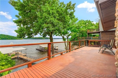 Welcome to your dream lakefront retreat in the Lake of the