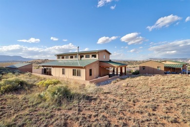 Come and enjoy the vistas of Abiquiu Lake and the red rocks of - photo 30