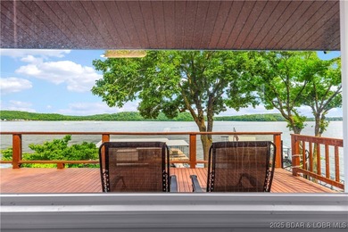 Welcome to your dream lakefront retreat in the Lake of the