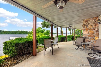 Welcome to your dream lakefront retreat in the Lake of the