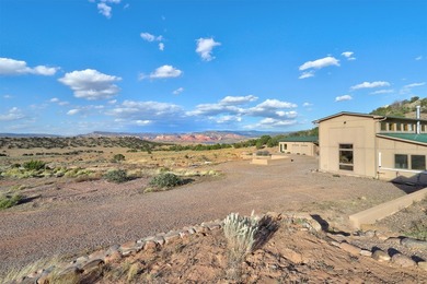 Come and enjoy the vistas of Abiquiu Lake and the red rocks of - photo 32