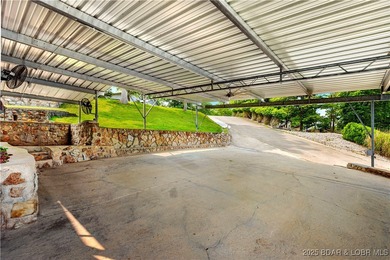 Welcome to your dream lakefront retreat in the Lake of the