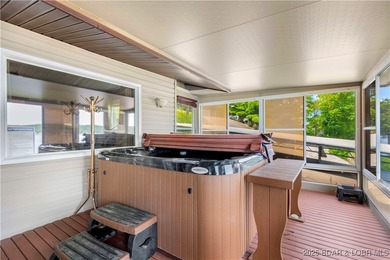 Welcome to your dream lakefront retreat in the Lake of the