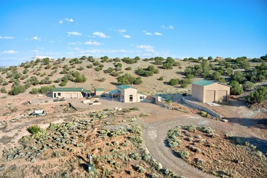 Come and enjoy the vistas of Abiquiu Lake and the red rocks of - photo 36
