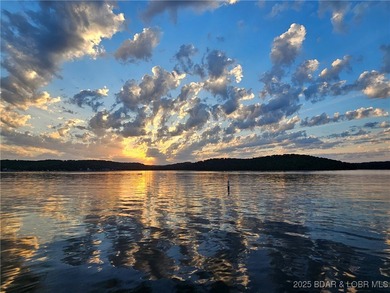 Welcome to your dream lakefront retreat in the Lake of the