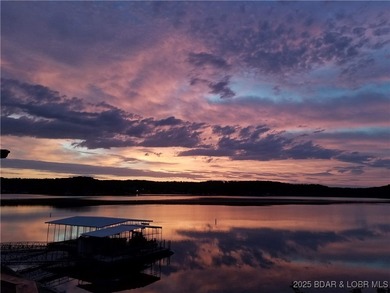 Welcome to your dream lakefront retreat in the Lake of the