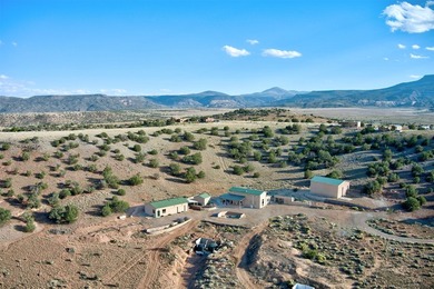 Come and enjoy the vistas of Abiquiu Lake and the red rocks of - photo 38