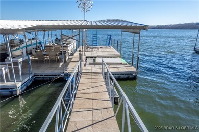 Welcome to your dream lakefront retreat in the Lake of the