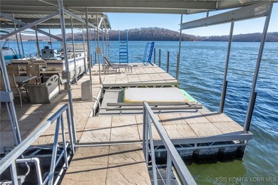 Welcome to your dream lakefront retreat in the Lake of the