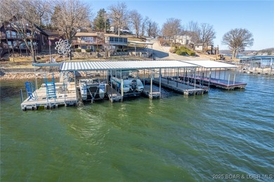 Welcome to your dream lakefront retreat in the Lake of the
