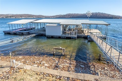 Welcome to your dream lakefront retreat in the Lake of the