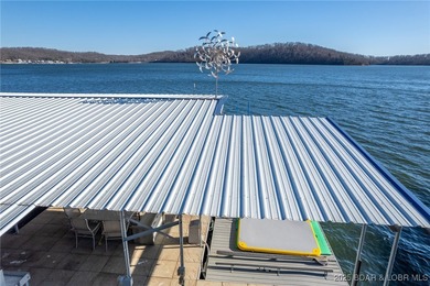 Welcome to your dream lakefront retreat in the Lake of the