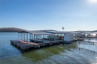 Welcome to your dream lakefront retreat in the Lake of the