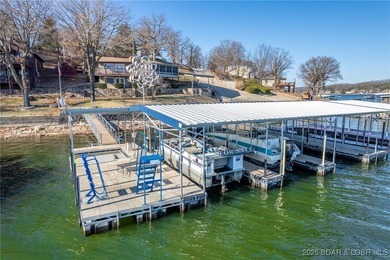 Welcome to your dream lakefront retreat in the Lake of the