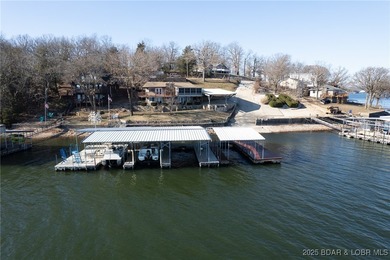 Welcome to your dream lakefront retreat in the Lake of the