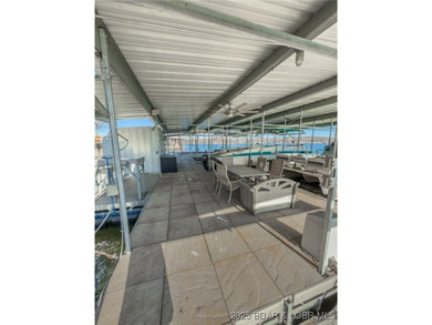 Welcome to your dream lakefront retreat in the Lake of the