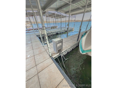 Welcome to your dream lakefront retreat in the Lake of the