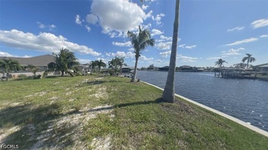This PREMIER lot is on a HUGE intersecting canal with a - photo 3
