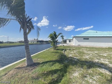 This PREMIER lot is on a HUGE intersecting canal with a - photo 4