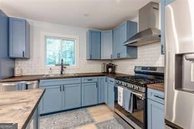 Nestled on a level lot just over half an acre, this beautifully - photo 11