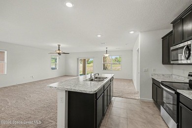 Welcome home! This 3-bedroom home sits on the Indian River - photo 11