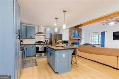 Nestled on a level lot just over half an acre, this beautifully - photo 12