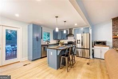 Nestled on a level lot just over half an acre, this beautifully - photo 13