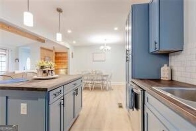 Nestled on a level lot just over half an acre, this beautifully - photo 14