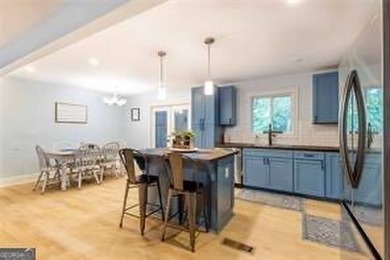 Nestled on a level lot just over half an acre, this beautifully - photo 15