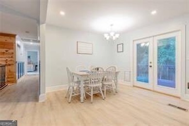 Nestled on a level lot just over half an acre, this beautifully - photo 16